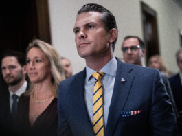 UNITED STATES - DECEMBER 3: Pete Hegseth, President-elect Donald Trump's nominee to be defense secretary, and his wife Jennifer, make their way to a meeting with Sen. Ted Budd, R-N.C., in Russell building on Tuesday, December 3, 2024. (Tom Williams/CQ-Roll Call, Inc via Getty Images)