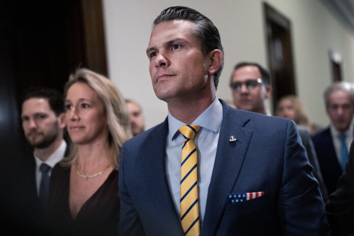 UNITED STATES - DECEMBER 3: Pete Hegseth, President-elect Donald Trump's nominee to be defense secretary, and his wife Jennifer, make their way to a meeting with Sen. Ted Budd, R-N.C., in Russell building on Tuesday, December 3, 2024. (Tom Williams/CQ-Roll Call, Inc via Getty Images)