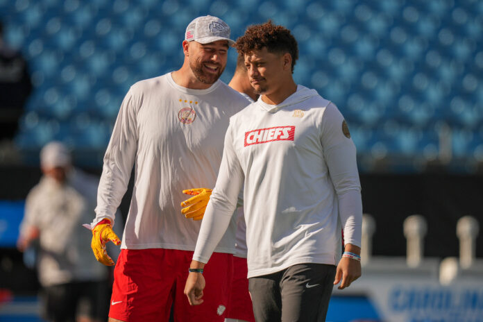 CHARLOTTE, NORTH CAROLINA - NOVEMBER 24: Travis Kelce #87 and Patrick Mahomes #15 of the Kansas City Chiefs warms up during the game against the Carolina Panthers at Bank of America Stadium on November 24, 2024 in Charlotte, North Carolina. (Photo by Grant Halverson/Getty Images)