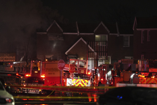 First responders work the scene after what witnesses say was a plane crash in Philadelphia, Friday, Jan. 31, 2025. (AP Photo/Matt Rourke)