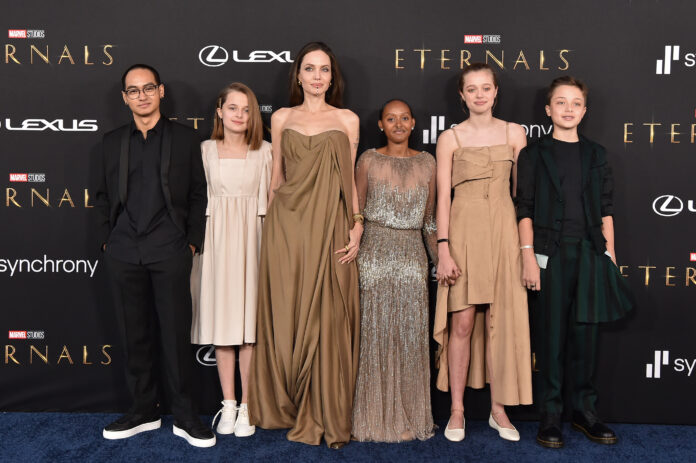 LOS ANGELES, CALIFORNIA - OCTOBER 18: (L-R) Maddox Jolie-Pitt, Vivienne Jolie-Pitt, Angelina Jolie, Knox Jolie-Pitt, Shiloh Jolie-Pitt, and Zahara Jolie-Pitt attend the Los Angeles Premiere of Marvel Studios' 