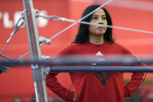 Rutgers suspends women’s gymnastics coach following report of a toxic team atmosphere.