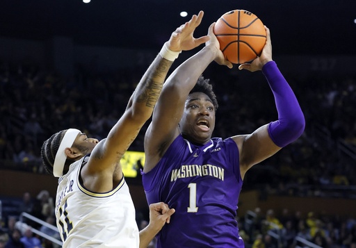 Goldin and Burnett guide No. 24 Michigan to a 91-75 victory against Washington