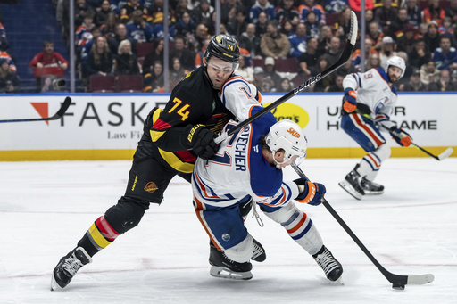 Quinn Hughes nets two power-play goals in Canucks’ 3-2 victory over Oilers