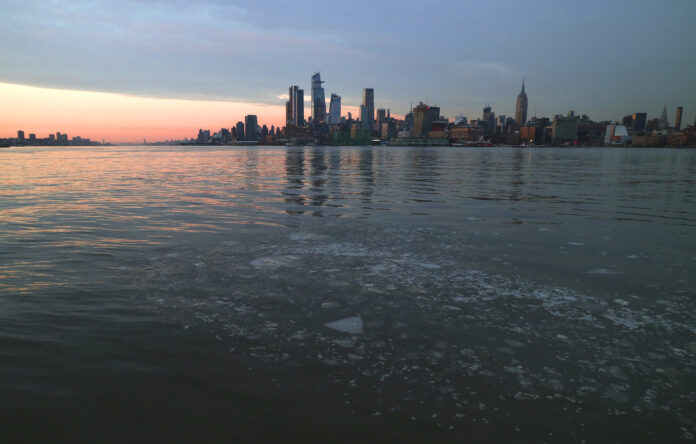 HOBOKEN, NJ - FEBRUARY 1: Ice floats in the Hudson River in front of Hudson Yards and the Empire State Building in New York City on February 1, 2019 as seen from Hoboken, New Jersey. (Photo by Gary Hershorn/Getty Images)