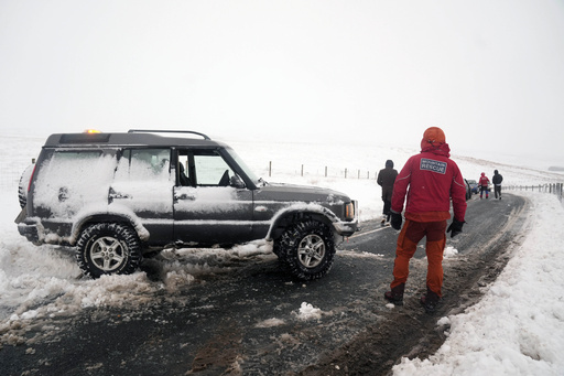 Numerous individuals saved as heavy rainfall causes flooding and travel disruptions in areas of the UK