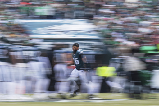 Saquon Barkley stars for Eagles, scoring 3 touchdowns in NFC Championship victory.