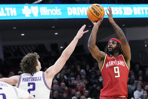 Northwestern secures 76-74 victory over Maryland with Nick Martinelli’s last-second jumper before overtime ends.