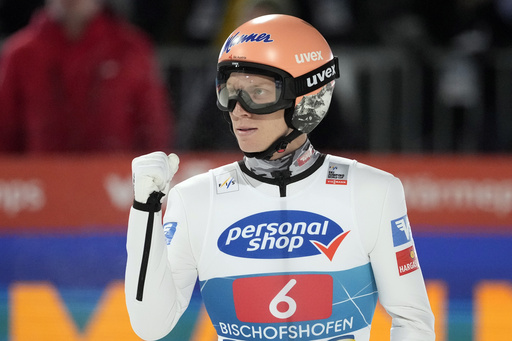 Tschofenig clinches the Four Hills ski jumping championship as experienced teammate Kraft falters on final jump.