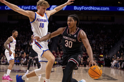 Fifth-ranked Florida rallies from 14-point hole to defeat South Carolina, 70-69