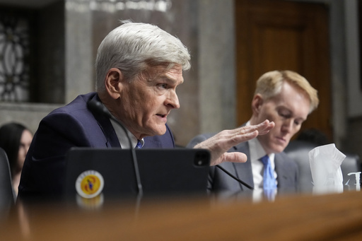 Sen. Bill Cassidy, R-La., questions Robert F. Kennedy Jr., President Donald Trump's choice to be Secretary of Health and Human Services, as he appears before the Senate Finance Committee for his confirmation hearing, at the Capitol in Washington, Wednesday, Jan. 29, 2025. (AP Photo/Ben Curtis)