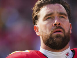 KANSAS CITY, MO - DECEMBER 21: Travis Kelce #87 of the Kansas City Chiefs looks on before kickoff against the Houston Texans during an NFL football game at GEHA Field at Arrowhead Stadium on December 21, 2024 in Kansas City, Missouri. (Photo by Cooper Neill/Getty Images)