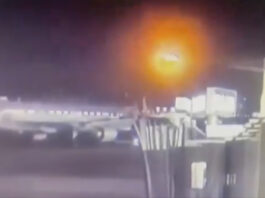 Footage from a security camera at Ronald Reagan Washington National Airport in Arlington, Va., shows an American Airlines jet colliding with an Army helicopter during landing, Wednesday, Jan. 29, 2025. (Ronald Reagan Washington National Airport via AP)