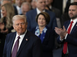 President Donald Trump finishes his inaugural address as Vice President JD Vance applauds during the 60th Presidential Inauguration in the Rotunda of the U.S. Capitol in Washington, Monday, Jan. 20, 2025. (AP Photo/Julia Demaree Nikhinson, Pool)