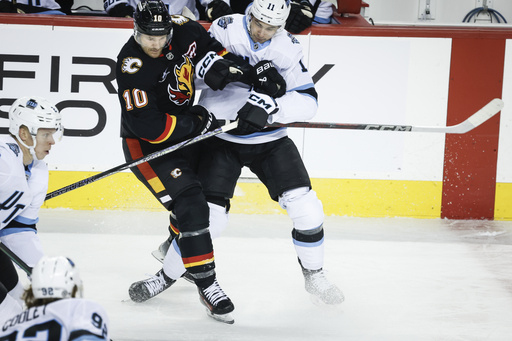 Lawson Crouse nets two goals as Utah snaps five-game winless run with 5-3 triumph against Flames.