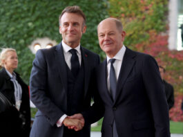 BERLIN, GERMANY - OCTOBER 18: German Chancellor Olaf Scholz greets French President Emmanuel Macron at the Chancellery on October 18, 2024 in Berlin, Germany. U.S. President Joe Biden is visiting Berlin to meet with Scholz, British Prime Minister Keir Starmer and French President Emmanuel Macron. (Photo by Maja Hitij/Getty Images)