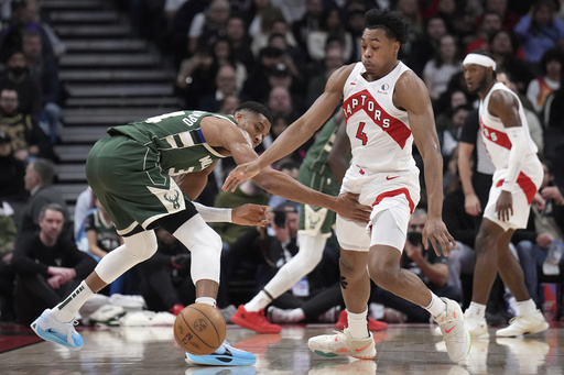 Bucks dominate Raptors 128-104 as Antetokounmpo records triple-double and Lillard scores 25 points