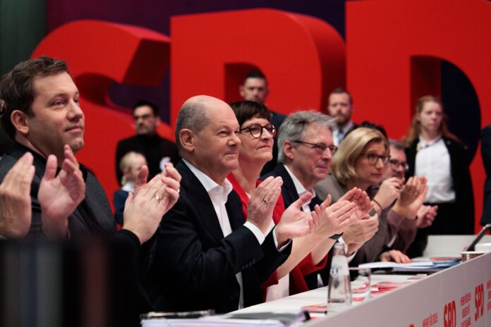 BERLIN, GERMANY - JANUARY 11: (left to right) Lars Klingbeil, SPD co-leader, Chancellor Olaf Scholz, and Saskia Esken SPD co-leader, at the SPD party congress on January 11, 2025 in Berlin, Germany. Germany is scheduled to hold snap parliamentary elections on February 23 following the collapse of the SPD-led three-party federal government coalition last November. (Photo by Carsten Koall/Getty Images)