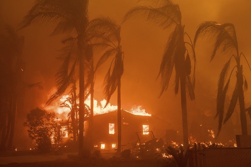 FILE - A home burns in the Eaton Fire in Altadena, Calif., Jan. 8, 2025. (AP Photo/Nic Coury, File)