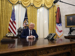 FILE - President Donald Trump answers questions from reporters as he signs an executive orders in the Oval Office of the White House, Jan. 23, 2025, in Washington. (AP Photo/Ben Curtis, File)