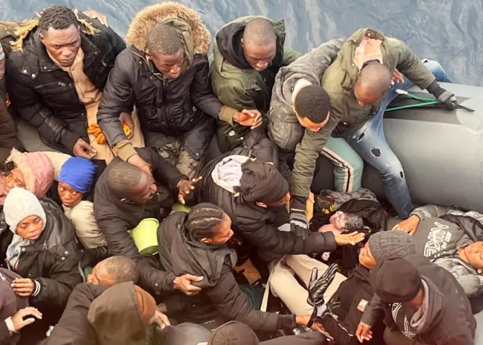 A baby is born inside a rubber boat with other migrants who were rescued off the Spanish Canary Island of Lanzarote, in this image obtained on Wednesday. Salvamento Maritimo via Reuters (Photo: NBC News)