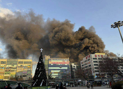 Firefighters in South Korea combat fire at a commercial structure in Seongnam.