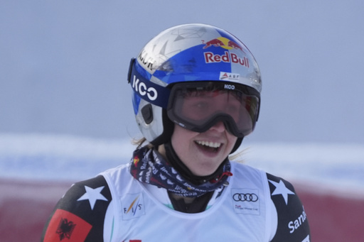 Olympic gold medalist Sara Hector clinches World Cup giant slalom title after ex-leader Federica Brignone takes a tumble.