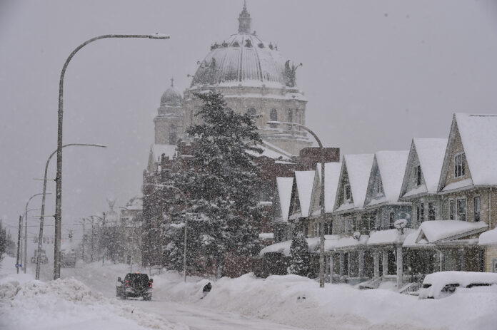 LACKAWANNA , NEW YORK - JANUARY 18: The Our Lady Of Victory National Shrine and Basilica is covered in snow along South Park Avenue on January 18, 2024 in Lackawanna, New York. The suburb of Buffalo was one of the areas hit the hardest by a lake-effect snowstorm that dumped as much as 65 inches of snow over a 24-hour period this week. (Photo by John Normile/Getty Images)