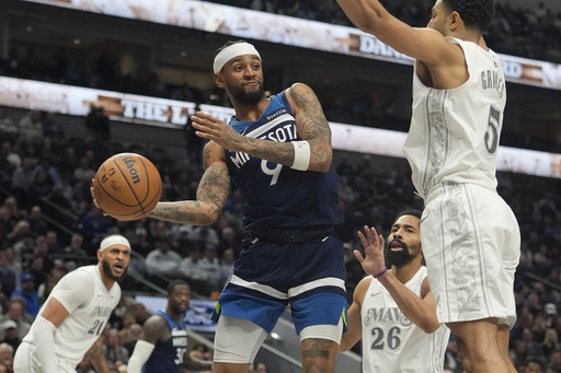 Jaden McDaniels scores a personal best of 27 points, leading Wolves to a narrow 115-114 victory over Mavericks