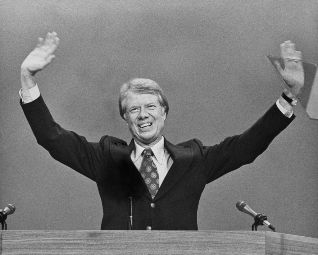 American politician Jimmy Carter smiles and waves to the auditorium at the close of the 1976 Democratic National Convention, where Carter was confirmed as the Democratic Party's presidential candidate, held at Madison Square Garden in New York City, New York, 15th July 1976, Later that year, the former Governor of Georgia won the 1976 United States presidential election. (Photo by Archive Photos/Hulton Archive/Getty Images)