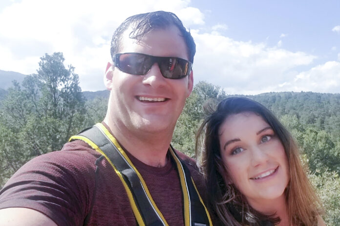 This undated photo provided by Alicia Arritt, shows her with former Army Special Forces soldier Matthew Livelsberger, who died by suicide in a Cybertruck that exploded in front of a Trump hotel in Las Vegas on New Years Day, Wednesday, Jan. 1, 2025. (Alicia Arritt via AP)