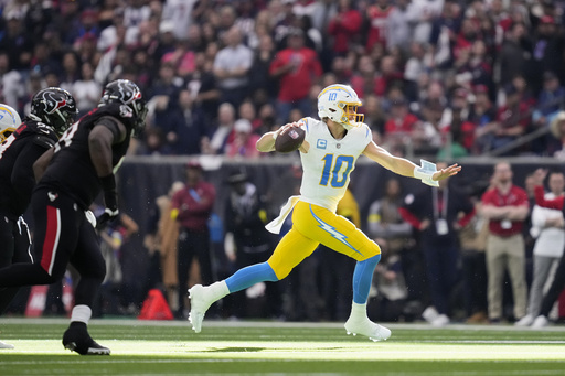 Herbert’s record-setting 4 interceptions lead to Chargers’ wild-card playoff defeat against Texans