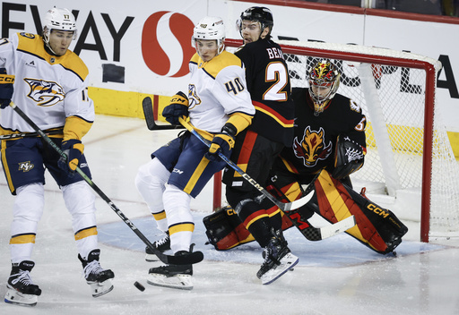 Ryan O’Reilly scores three goals as Predators defeat Flames 4-1 for consecutive wins.