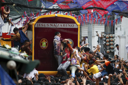 Massive procession honors Jesus statue as Filipino Catholics seek health and peace through prayer