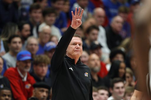 J’Wan Roberts nets 24 points as No. 7 Houston triumphs over No. 12 Kansas 92-86 in double overtime.