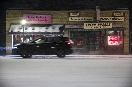 Winter storm that brought unprecedented snowfall to New Orleans extends into Florida and the Carolinas.