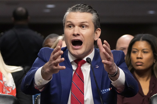 Pete Hegseth, President-elect Donald Trump's choice to be Defense secretary, appears before the Senate Armed Services Committee for his confirmation hearing, at the Capitol in Washington, Tuesday, Jan. 14, 2025. (AP Photo/Alex Brandon)