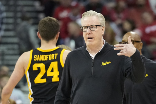 John Blackwell nets 32 points as Wisconsin sets a program record with 21 three-pointers in a 116-85 win against Iowa.