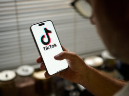 The TikTok app logo is seen in this photo illustration taken in Warsaw, Poland on 18 November, 2024. The Canadian government has ordered the social media giant to wind down its business operations in the country. The decision, announced on Nov. 7, is based on national security concerns tied to TikTok's Chinese ownership and follows a year-long review of the app's Canadian operations. (Photo by Jaap Arriens/NurPhoto via Getty Images)