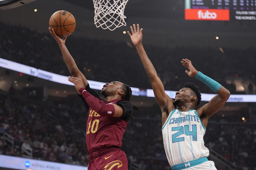 Darius Garland nets 25 points as the top-ranked Cavaliers secure a 115-105 victory over the Hornets, marking their 10th consecutive win.