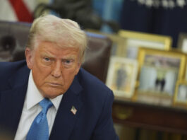 President Donald Trump speaks to reporters as he signs executive orders in the Oval Office of the White House, Friday, Jan. 31, 2025, in Washington. (AP Photo/Evan Vucci)