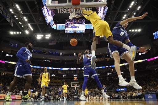 Kam Jones nets 14 points as No. 16 Marquette easily defeats Seton Hall 80-56