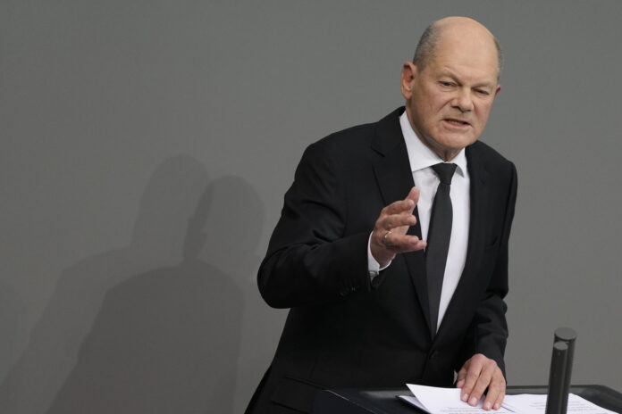 German Chancellor Olaf Scholz speaks at the start of a debate about immigration at the German parliament Bundestag in Berlin, Germany, Jan. 29, 2025. (AP Photo/Markus Schreiber, File)