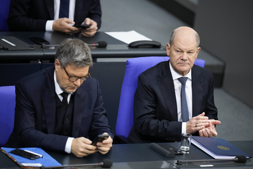 Scholz and Merz debate German economic and migration issues in final parliamentary session ahead of election.