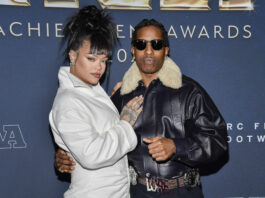 A$AP-Rocky-Shooting-Trial FILE - Collaboration of the year honoree A$AP Rocky, right, and Rihanna attend the 38th annual Footwear News Achievement Awards at Cipriani South Street on Dec. 4, 2024, in New York. (Photo by Evan Agostini/Invision/AP, file)