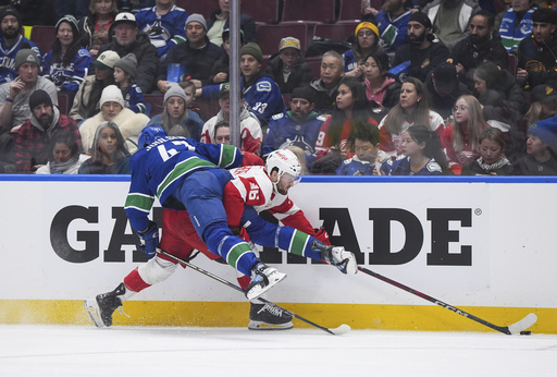 Alex DeBrincat nets overtime goal, leading Red Wings past Canucks 3-2