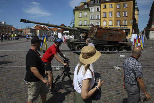 Polish authorities investigate a display of Ukrainian-origin Russian military equipment featuring live explosives.