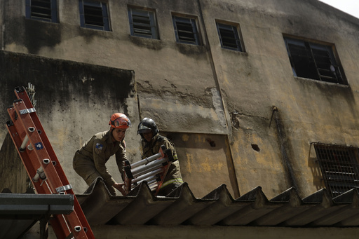 At least 10 individuals admitted to hospital due to blaze at Rio de Janeiro’s Carnival costume production facility.