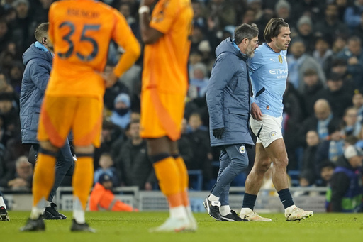 Jack Grealish of Man City suffers injury during match with Real Madrid