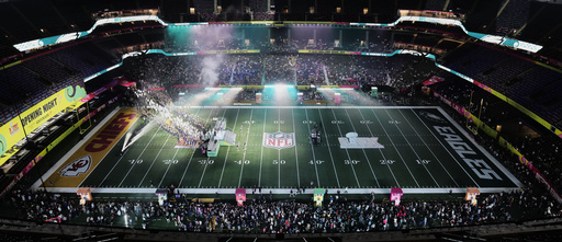 Philadelphia Eagles players enter the stadium for Super Bowl 59 Opening Night, Monday, Feb. 3, 2025, in New Orleans, ahead of the NFL football game between the Philadelphia Eagles and the Kansas City Chiefs Sunday. (AP Photo/David J. Phillip)